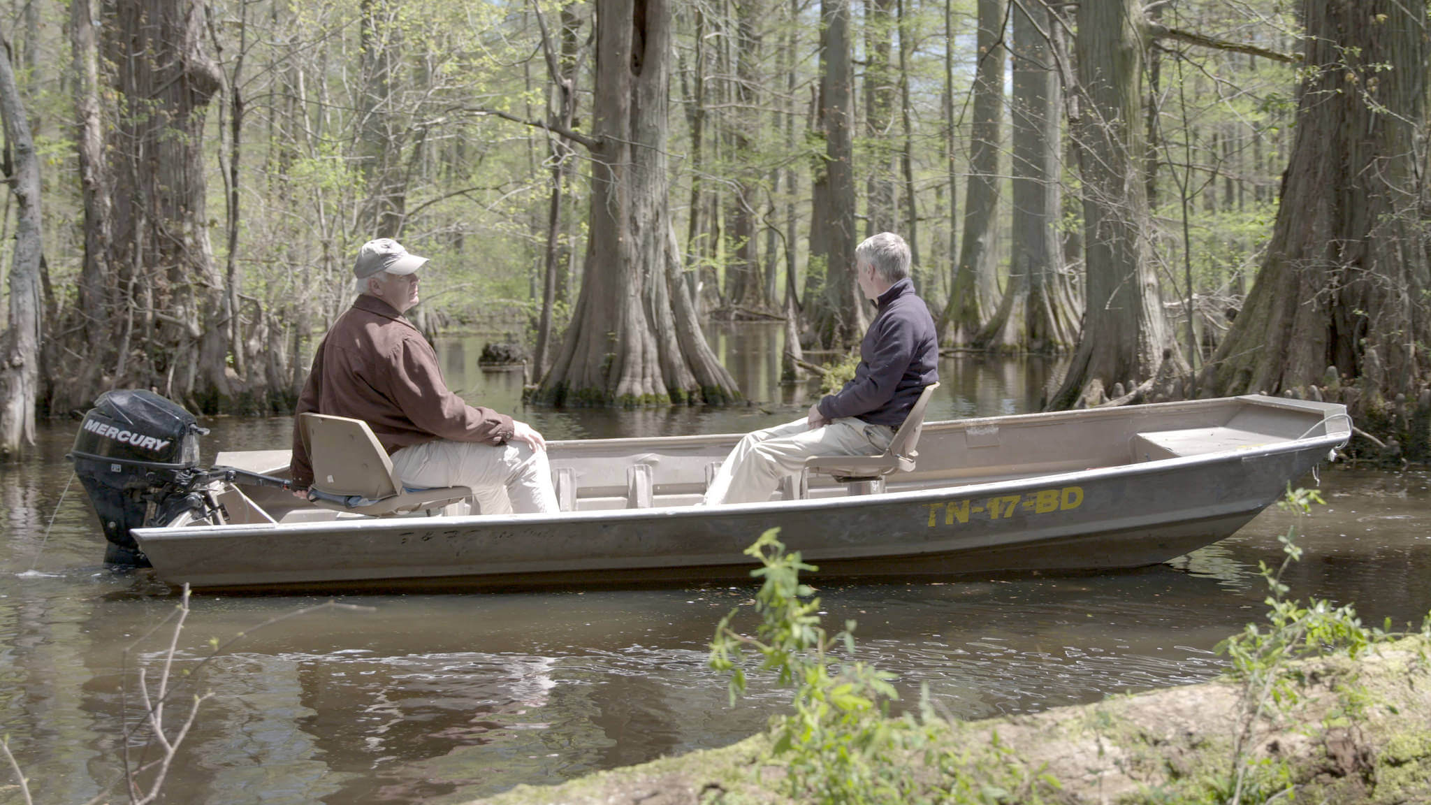 Stuart Burgess and Del Tackett in a boat on Reelfoot Lake